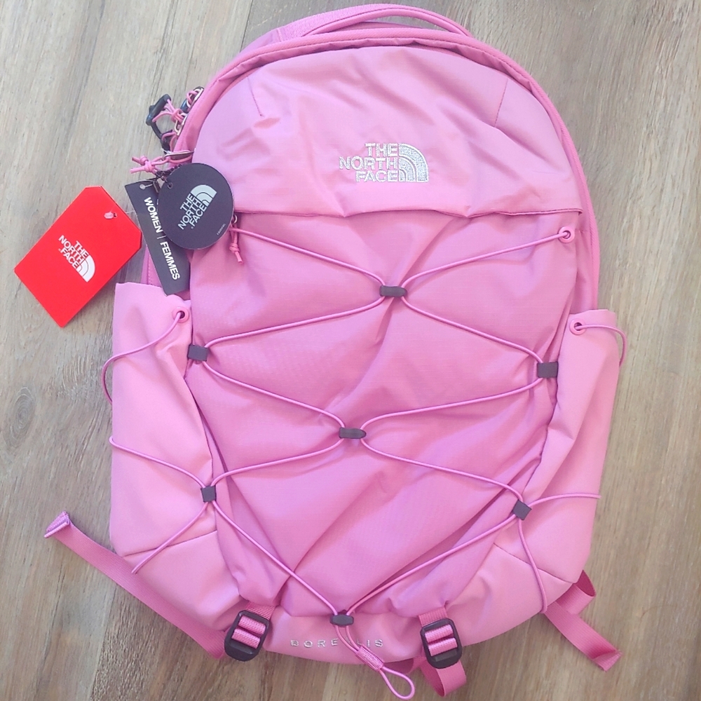 bubblegum pink north face backpack The Women's Vault Everyday Laptop A rain jacket or hoody can be stuffed under the exterior bungee for quick stowing on the go. The North Face Jester Everyday